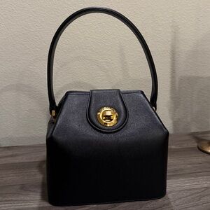 Authentic vintage Givenchy leather top-handle bag w gold hardware